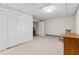 Bedroom featuring carpet floors, closet, and a vintage rocking chair at 4411 Windsor Oaks Cir, Marietta, GA 30066