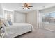 Comfortable bedroom with a ceiling fan, bright windows, and a neutral palette creating a tranquil atmosphere at 4411 Windsor Oaks Cir, Marietta, GA 30066
