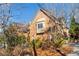 Beautiful two-story brick home with mature landscaping and a charming bay window at 4411 Windsor Oaks Cir, Marietta, GA 30066