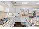 Elegant kitchen with granite countertops, stainless appliances, and ample storage at 4411 Windsor Oaks Cir, Marietta, GA 30066