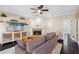 Inviting living room with a fireplace, hardwood floors, and a stylish TV console at 4411 Windsor Oaks Cir, Marietta, GA 30066