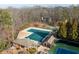 Community pool with bathhouse, adjacent tennis and pickleball courts for active lifestyles at 4411 Windsor Oaks Cir, Marietta, GA 30066