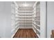 Spacious walk-in closet with ample shelving and storage at 4411 Windsor Oaks Cir, Marietta, GA 30066