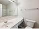 A clean bathroom with a new, modern sink and white finishes at 622 Providence Sw Pl, Atlanta, GA 30331