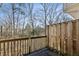 Wooden deck featuring a natural setting with mature trees at 622 Providence Sw Pl, Atlanta, GA 30331