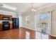 Dining area features hardwood floors and a sliding glass door leading to the deck at 622 Providence Sw Pl, Atlanta, GA 30331