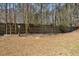 Community dog park with fenced area and pet waste station for convenient and responsible pet ownership at 622 Providence Sw Pl, Atlanta, GA 30331