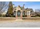 Stately building with stone accents, columns, and manicured landscaping at 622 Providence Sw Pl, Atlanta, GA 30331