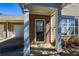 Charming front entrance with brick accents, white pillars, and well-maintained landscaping at 1130 Camry Cir, Dallas, GA 30157