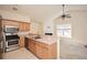 Well-equipped kitchen with stainless steel appliances and an open view to the adjacent living area at 1130 Camry Cir, Dallas, GA 30157