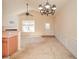 Open-concept space with vaulted ceiling, a fireplace, and a view from kitchen at 1130 Camry Cir, Dallas, GA 30157