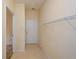 Mud room features tile flooring, wire racks, and door leading to exterior for convenience at 1130 Camry Cir, Dallas, GA 30157