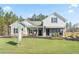 Charming single-story model home with well-manicured lawn and inviting entrance at 145 Silver Leaf Trce, Douglasville, GA 30134