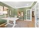 Inviting office space with stylish decor, white desk, and natural light, perfect for remote work at 145 Silver Leaf Trce, Douglasville, GA 30134