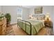 Cozy bedroom with ample natural light, rustic accents, and comfortable furnishings at 27 Spring Se Dr, Marietta, GA 30060