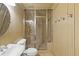 Bathroom with a tiled shower, glass door, sink, toilet and chrome fixtures at 3977 Sweet Bottom Dr, Duluth, GA 30096