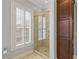 Well-lit bathroom showcases a walk-in shower, white shuttered window, and a dark wood cabinet at 3977 Sweet Bottom Dr, Duluth, GA 30096