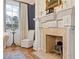 Close-up on a beautifully decorated fireplace with detailed carvings and design at 3977 Sweet Bottom Dr, Duluth, GA 30096