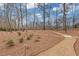 Beautifully landscaped gardens with gravel pathways wind through this gorgeous property at 3977 Sweet Bottom Dr, Duluth, GA 30096