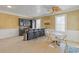 Charming kitchen with black cabinets, a bar area with stools, and a dining table at 3977 Sweet Bottom Dr, Duluth, GA 30096
