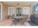 Cozy outdoor patio with comfortable seating and a grill at 3977 Sweet Bottom Dr, Duluth, GA 30096