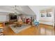 Playroom with hardwood floors, a window seat, and an open floor plan at 3977 Sweet Bottom Dr, Duluth, GA 30096