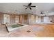 A gorgeous outdoor spa room offers brick walls, ceiling fans, and a stylish in-ground spa at 3977 Sweet Bottom Dr, Duluth, GA 30096