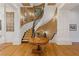 Grand staircase with detailed ironwork and classic design at 3977 Sweet Bottom Dr, Duluth, GA 30096