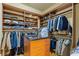 Organized walk-in closet featuring custom shelves and storage at 3977 Sweet Bottom Dr, Duluth, GA 30096