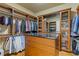 Walk-in closet with custom shelving and storage at 3977 Sweet Bottom Dr, Duluth, GA 30096