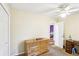 Bedroom with a ceiling fan, a closet, and an adjacent bedroom at 60 Mountain View Cir, Covington, GA 30016
