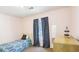 Calm bedroom with a bed, light pink walls, curtains, and natural light at 60 Mountain View Cir, Covington, GA 30016