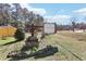 Welcoming Hidden Pines community sign with stone base and lush landscaping at 60 Mountain View Cir, Covington, GA 30016