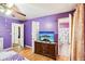 Well-lit main bedroom with wood floors and ensuite bathroom access at 60 Mountain View Cir, Covington, GA 30016