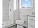 Bathroom with tiled shower, vanity, and toilet at 697 Fayetteville Road, Atlanta, GA 30316