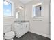 Bathroom featuring hexagon tile floors and large vanity at 697 Fayetteville Road, Atlanta, GA 30316