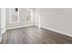 Bedroom with new wood flooring, two windows, and white trim at 697 Fayetteville Road, Atlanta, GA 30316