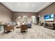 Inviting living room featuring modern decor, comfortable seating, and a large flat screen television at 1080 Peachtree Ne St # 2807, Atlanta, GA 30309