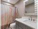 Modern bathroom showcasing a neutral marble shower curtain, gray vanity, and quartz countertop at 3186 Quail Ct, Decatur, GA 30034