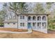 Charming two-story home with inviting blue door and upper-level balconies at 3186 Quail Ct, Decatur, GA 30034