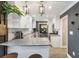 Modern kitchen with white cabinets, gray countertops, and stainless steel appliances at 3186 Quail Ct, Decatur, GA 30034