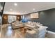 Open-concept living room with dark accent wall and modern furniture at 3186 Quail Ct, Decatur, GA 30034