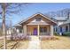 Charming bungalow with a welcoming front porch and a freshly landscaped yard at 1253 Lucile Sw Ave, Atlanta, GA 30310