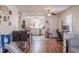 Bright and airy living space showcasing hardwood floors, a dining area, and a seamless connection to the kitchen at 2951 N Mckoy Rd, Villa Rica, GA 30180