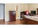 Cozy bedroom features a dark wood crib, matching dresser, and warm color scheme at 3958 Waldrop Hills Dr, Decatur, GA 30034