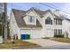 Charming two-story home with attached garage, offering a blend of comfort and style at 3958 Waldrop Hills Dr, Decatur, GA 30034