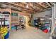 Unfinished basement area, with exposed ceiling, provides ample storage space with shelving units at 624 Hemlock Trl, Canton, GA 30114