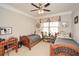 Charming bedroom with two twin beds, a ceiling fan, and a cozy, welcoming atmosphere at 624 Hemlock Trl, Canton, GA 30114