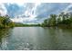 Expansive view of the lake with the treeline in the background at 624 Hemlock Trl, Canton, GA 30114