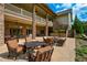 Outdoor patio space features comfortable seating and a view of the building's stone and wood accents at 624 Hemlock Trl, Canton, GA 30114